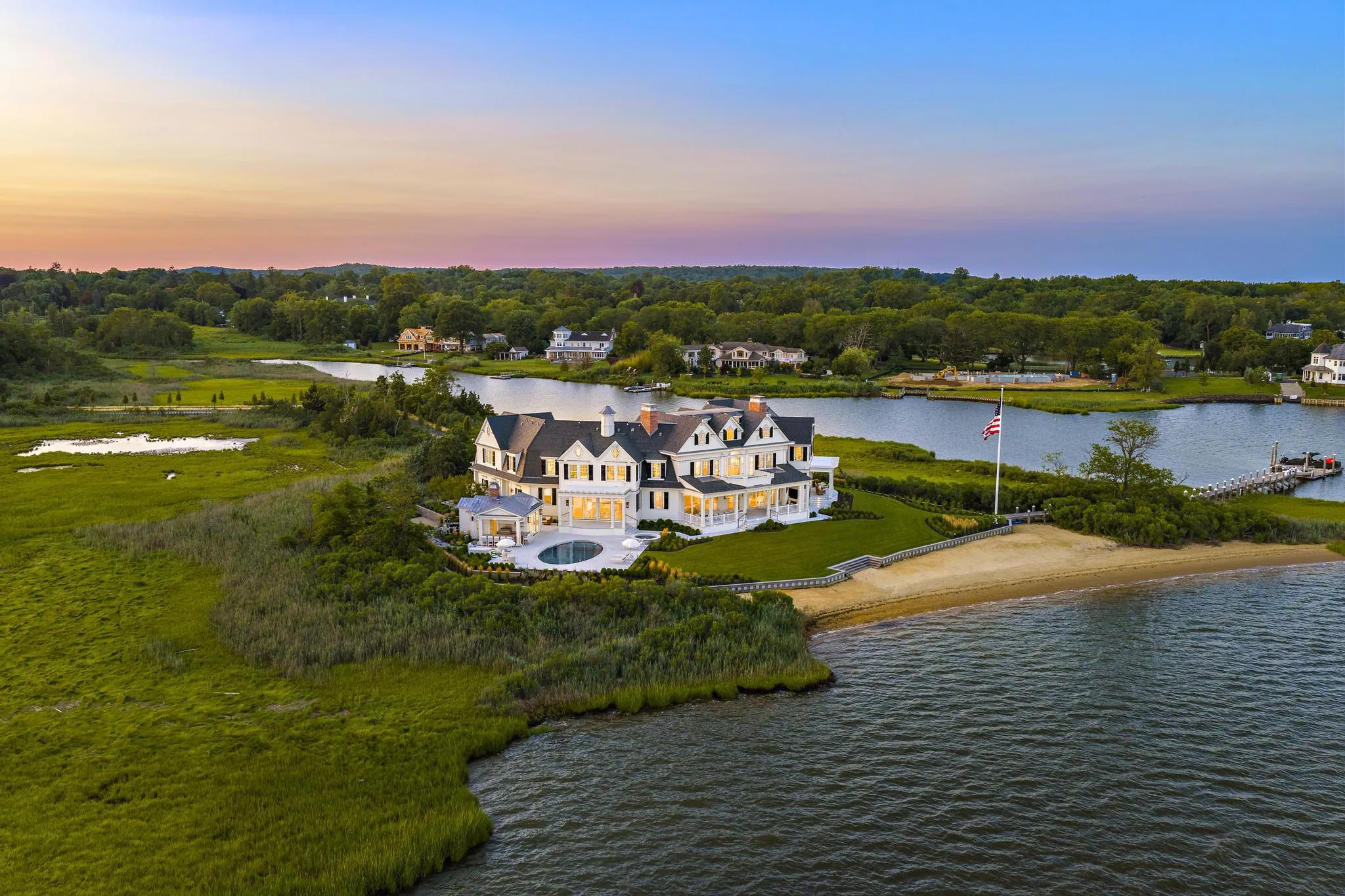 Aerial sunset at American Dream, a Merrick Construction custom home in Rumson, New Jersey