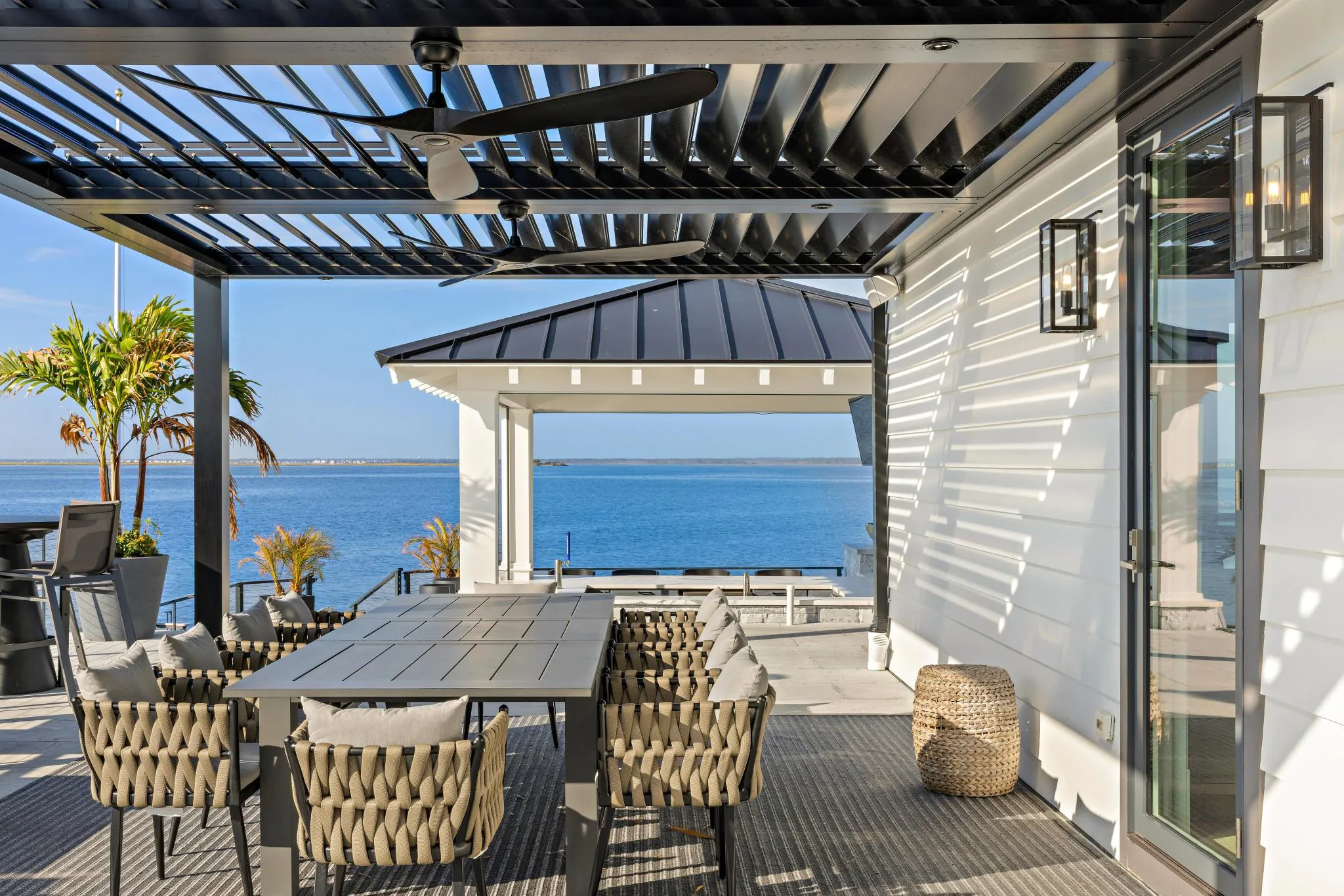 Covered patio at The Fun Starts Here, a Merrick Construction custom home in Brick, New Jersey