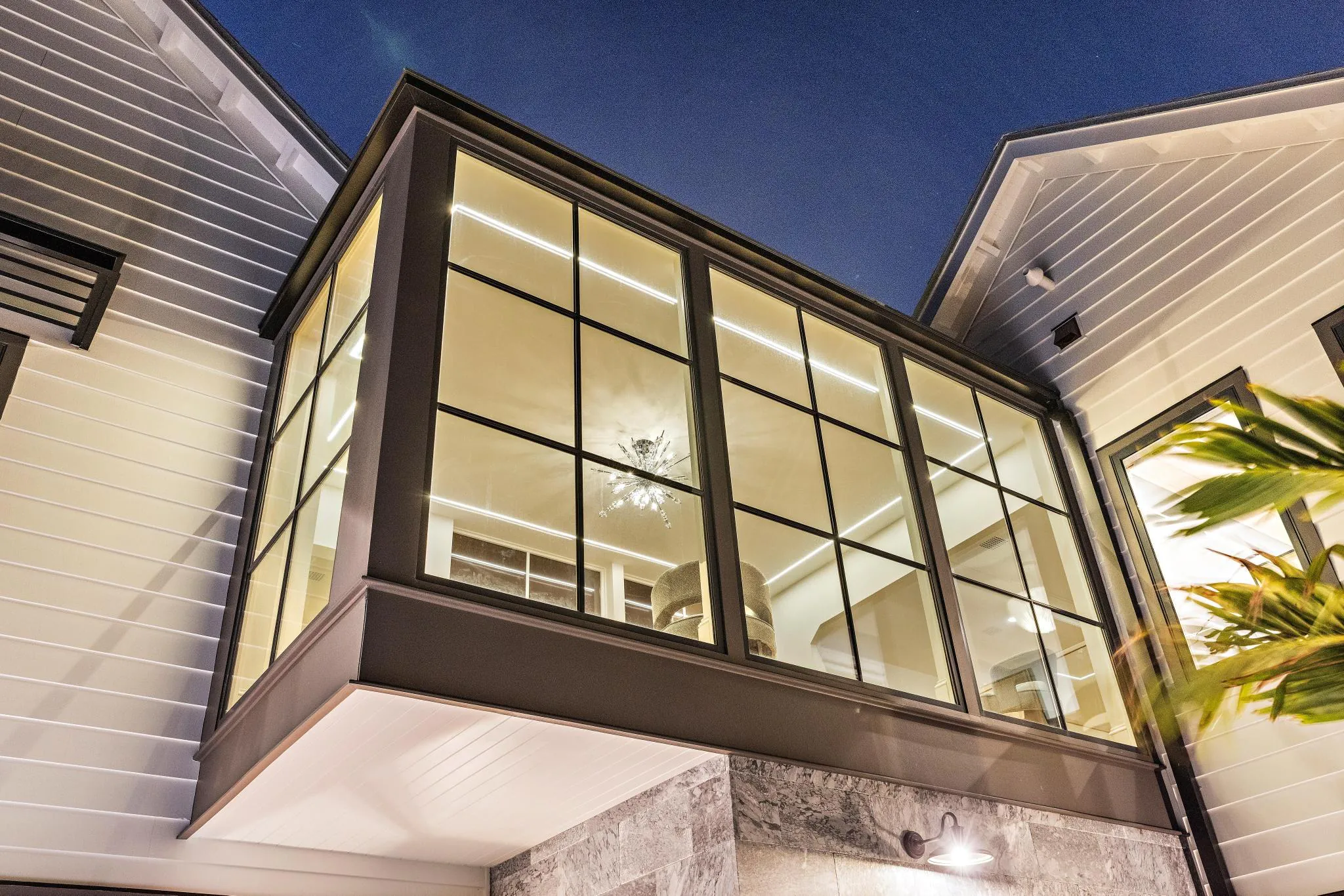 Exterior glass at The Fun Starts Here, a Merrick Construction custom home in Brick, New Jersey
