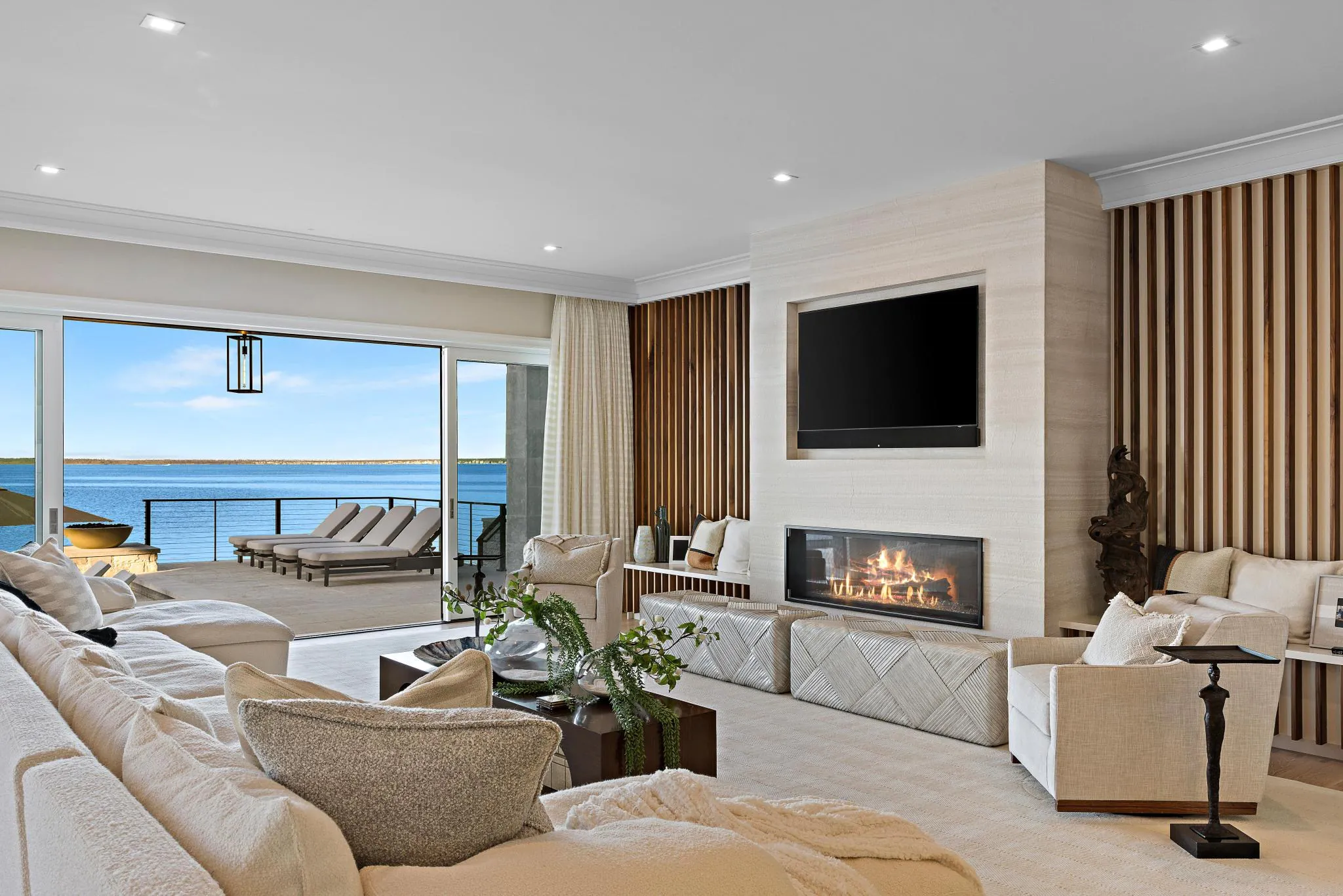 Living room at The Fun Starts Here, a Merrick Construction custom home in Brick, New Jersey